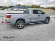 2012 Toyota Tundra с VIN 5TFUM5F19CX030886, выставлен на аукционе Copart как лот 82069335 с пробегом 144 900 миль миль и Списание • Salvage title. История ставок и продаж доступна на DreamBid. Изображение 3.