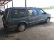 1993 Dodge Caravan Grand SE with VIN 1B4GH44R4PX759305, listed as a IAAI auction lot 42709077 with 206,919 mi miles and . Bid and sale history available at DreamBid. Image 4.