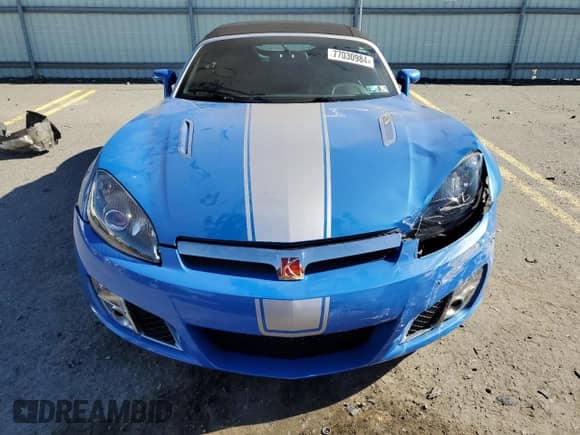 2009 Saturn Sky with VIN 1G8ML35X09Y107848, listed as a Copart auction lot 77030984 with 45,364 mi miles and Salvage title. Bid and sale history available at DreamBid. Image 5.