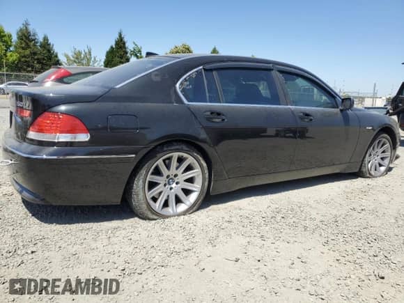 2002 BMW 7 Series 745Li with VIN WBAGN63482DR02390, listed as a Copart auction lot 64513685 with 135,239 mi miles and Salvage title. Bid and sale history available at DreamBid. Image 3.