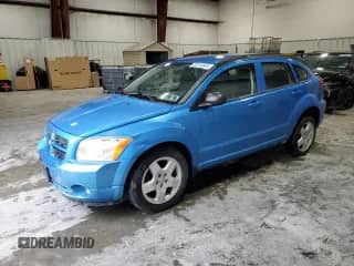 2009 Dodge Caliber SXT with VIN 1B3HB48A79D180120, listed as a Copart auction lot 82015045 with 76,788 mi miles and Clean title. Bid and sale history available at DreamBid. Image 1.