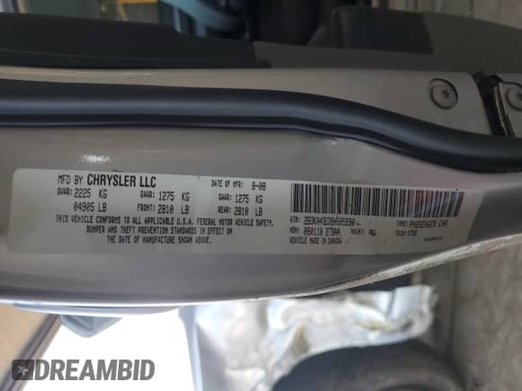 2009 Dodge Charger SE with VIN 2B3KA43D39H505990, listed as a Copart auction lot 71044214 with 223,573 mi miles and Salvage title. Bid and sale history available at DreamBid. Image 12.