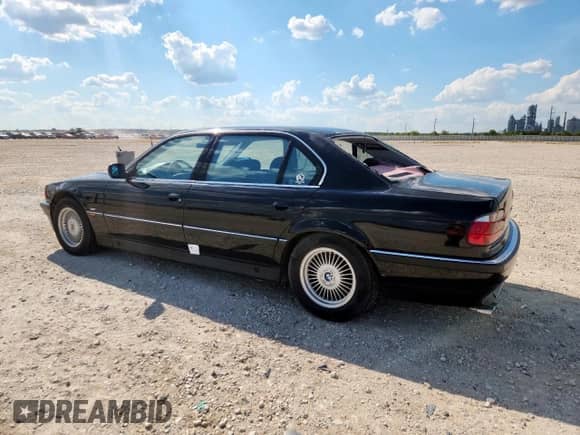 1998 BMW 7 Series с VIN WBAGK2327WDH68707, выставлен на аукционе Copart как лот 71478595 с пробегом 176 232 миль миль и Списание • Salvage title. История ставок и продаж доступна на DreamBid. Изображение 2.