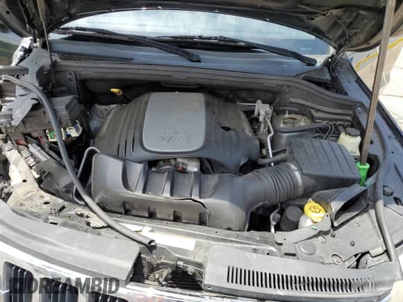 2012 Jeep Grand Cherokee Laredo с VIN 1C4RJEAT6CC301188, выставлен на аукционе Copart как лот 59602325 с пробегом 163 126 миль миль и Списание • Salvage title. История ставок и продаж доступна на DreamBid. Изображение 14.