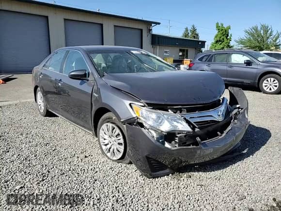 2012 Toyota Camry XLE with VIN 4T1BD1FK7CU017768, listed as a Copart auction lot 65020685 with 196,528 mi miles and Salvage title. Bid and sale history available at DreamBid. Image 13.