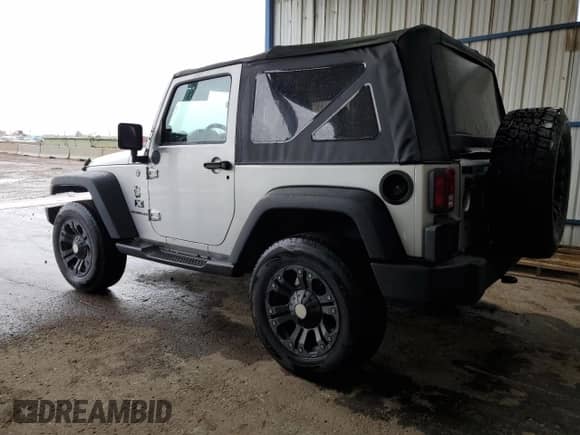 2007 Jeep Wrangler X с VIN 1J4FA24147L108727, выставлен на аукционе Copart как лот 80917185 с пробегом 105 147 миль миль и Списание • Salvage title. История ставок и продаж доступна на DreamBid. Изображение 2.