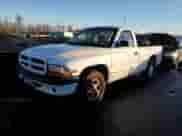 1999 Dodge Dakota SLT with VIN 1B7FL26X6XS142370, listed as a Copart auction lot 84569414 with 154,902 mi miles and Clean title. Bid and sale history available at DreamBid. Image 1.