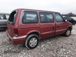 1995 Dodge Caravan with VIN 2B4GH2534SR102963, listed as a Copart auction lot 83561614 with 168,528 mi miles and Salvage title. Bid and sale history available at DreamBid. Image 3.