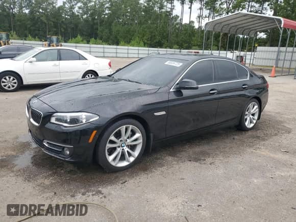 2015 BMW 5 Series 535i xDrive with VIN WBA5B3C57FD543952, listed as a Copart auction lot 80034725 with 72,153 mi miles and Salvage title. Bid and sale history available at DreamBid. Image 1.