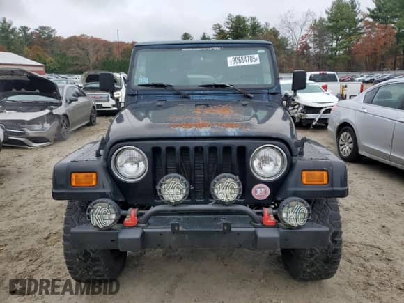 2001 Jeep Wrangler Sport z VIN 1J4FA49SX1P347129, wystawiony jako Copart lot #90684705 z przebiegiem 139 975 mil mil oraz Czysty tytuł • Clean title. Historia ofert i sprzedaży dostępna na DreamBid. Obrazek 5.