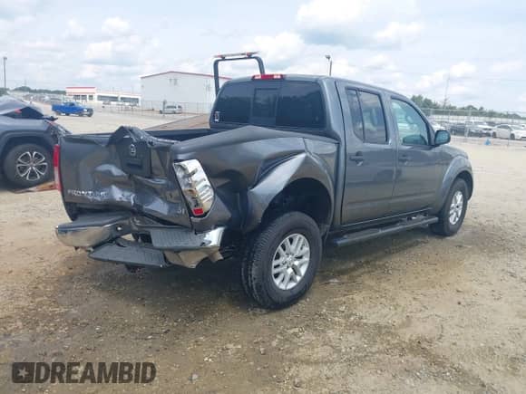 2018 Nissan Frontier SV with VIN 1N6AD0ER0JN757868, listed as a IAAI auction lot 43102856 with 52,445 mi miles and . Bid and sale history available at DreamBid. Image 4.