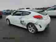 2013 Hyundai Veloster w/Black Int z VIN KMHTC6AD6DU180586, wystawiony jako Copart lot #81717425 z przebiegiem 91 070 mil mil oraz Szkoda całkowita • Salvage title. Historia ofert i sprzedaży dostępna na DreamBid. Obrazek 2.