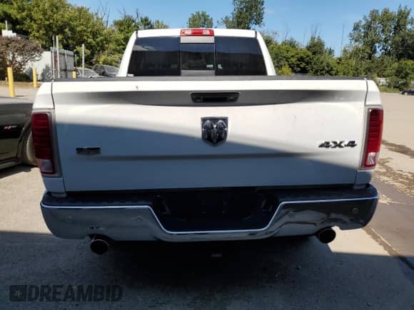 2014 Ram 1500 Laramie z VIN 1C6RR7VM8ES288421, wystawiony jako Copart lot #68515735 z przebiegiem 116 639 mil mil oraz Szkoda całkowita • Salvage title. Historia ofert i sprzedaży dostępna na DreamBid. Obrazek 6.