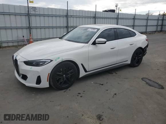 2022 BMW 4 Series 430i с VIN WBA63AV0XNFM01668, выставлен на аукционе Copart как лот 81702865 с пробегом 56 119 миль миль и Списание • Salvage title. История ставок и продаж доступна на DreamBid. Изображение 1.