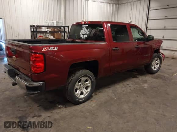 2014 Chevrolet Silverado 1500 LT with VIN 3GCUKREC4EG339740, listed as a IAAI auction lot 42933250 with 168,499 mi miles and . Bid and sale history available at DreamBid. Image 4.