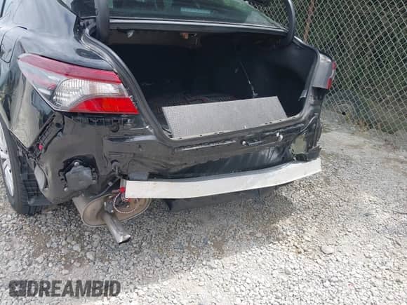 2022 Toyota Camry Hybrid LE with VIN 4T1C31AK3NU574937, listed as a IAAI auction lot 43038140 with 50,708 mi miles and . Bid and sale history available at DreamBid. Image 6.