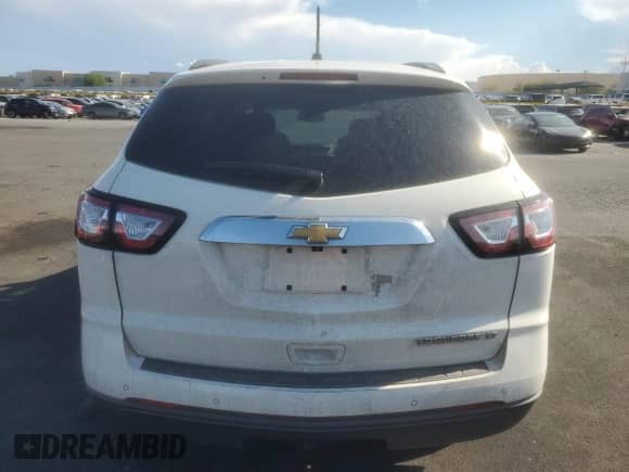2014 Chevrolet Traverse LT z VIN 1GNKRHKD0EJ339685, wystawiony jako Copart lot #71699335 z przebiegiem 148 101 mil mil oraz Czysty tytuł • Clean title. Historia ofert i sprzedaży dostępna na DreamBid. Obrazek 6.