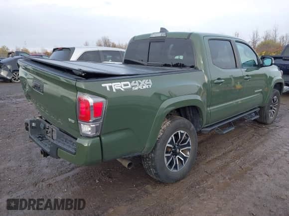 2021 Toyota Tacoma SR z VIN 3TMCZ5AN0MM378204, wystawiony jako IAAI lot #43469855 z przebiegiem 48 476 mil mil oraz . Historia ofert i sprzedaży dostępna na DreamBid. Obrazek 4.