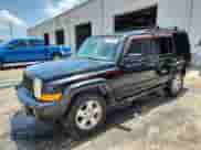 2006 Jeep Commander z VIN 1J8HH48N56C214873, wystawiony jako Copart lot #67211495 z przebiegiem 148 793 mil mil oraz Szkoda całkowita • Salvage title. Historia ofert i sprzedaży dostępna na DreamBid. Obrazek 1.