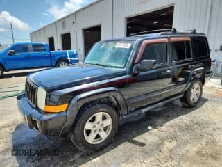 2006 Jeep Commander with VIN 1J8HH48N56C214873, listed as a Copart auction lot 67211495 with 148,793 mi miles and Salvage title. Bid and sale history available at DreamBid. Image 1.