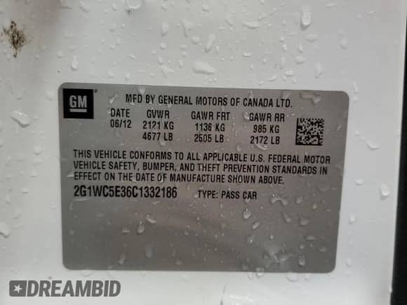 2012 Chevrolet Impala LTZ with VIN 2G1WC5E36C1332186, listed as a Copart auction lot 62693225 with 162,202 mi miles and Salvage title. Bid and sale history available at DreamBid. Image 12.