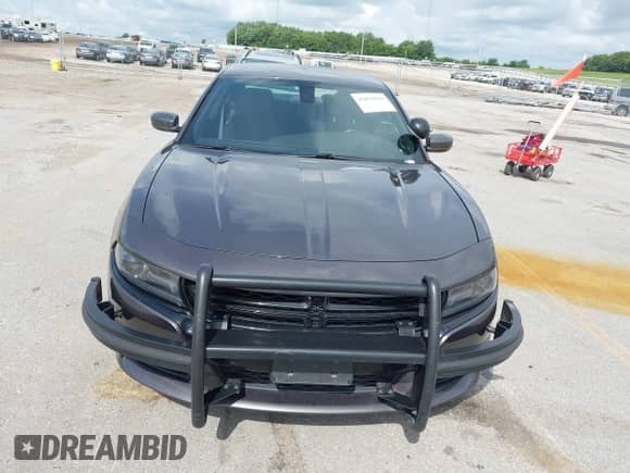 2020 Dodge Charger Police z VIN 2C3CDXKT4LH120180, wystawiony jako IAAI lot #42834441 z przebiegiem 128 459 mil mil oraz . Historia ofert i sprzedaży dostępna na DreamBid. Obrazek 6.