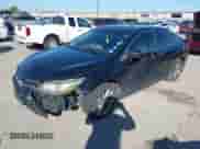 2015 Toyota Camry SE with VIN 4T1BF1FK4FU885659, listed as a IAAI auction lot 43585425 with 296,518 mi miles and . Bid and sale history available at DreamBid. Image 2.