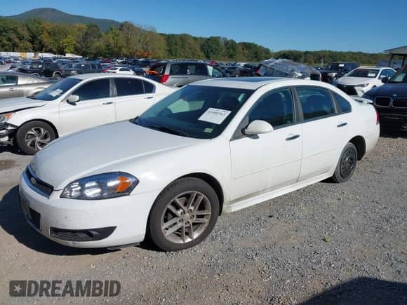 2013 Chevrolet Impala LTZ z VIN 2G1WC5E39D1173228, wystawiony jako IAAI lot #43400363 z przebiegiem 202 040 mil mil oraz . Historia ofert i sprzedaży dostępna na DreamBid. Obrazek 2.