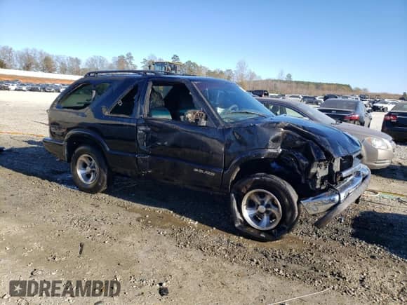 2000 Chevrolet Blazer LS с VIN 1GNCS18W4YK247518, выставлен на аукционе Copart как лот 79686403 с пробегом 235 660 миль миль и На запчасти • Non repairable. История ставок и продаж доступна на DreamBid. Изображение 4.