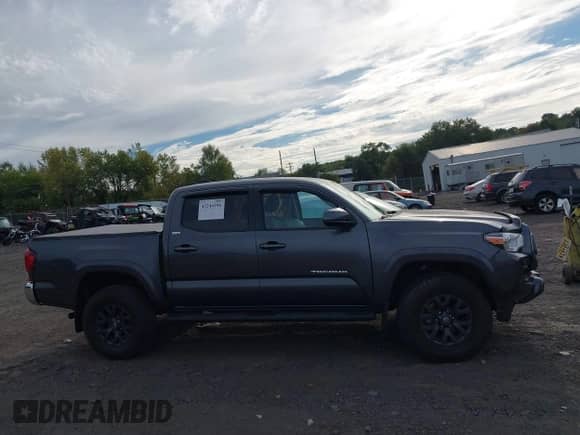 2021 Toyota Tacoma SR with VIN 3TMCZ5AN7MM383352, listed as a IAAI auction lot 43246296 with 44,937 mi miles and . Bid and sale history available at DreamBid. Image 13.