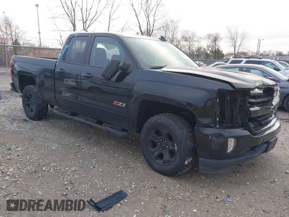 2019 Chevrolet Silverado 1500 LT z VIN 2GCVKPEC8K1230355, wystawiony jako IAAI lot #41124133 z przebiegiem 135 034 mil mil oraz . Historia ofert i sprzedaży dostępna na DreamBid. Obrazek 1.