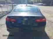 2018 Chevrolet Malibu LT z VIN 1G1ZD5ST7JF145740, wystawiony jako IAAI lot #43370388 z przebiegiem 94 051 mil mil oraz . Historia ofert i sprzedaży dostępna na DreamBid. Obrazek 16.