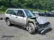 1999 Subaru Forester S with VIN JF1SF6557XH730701, listed as a Copart auction lot 65169235 with 142,246 mi miles and Salvage title. Bid and sale history available at DreamBid. Image 4.