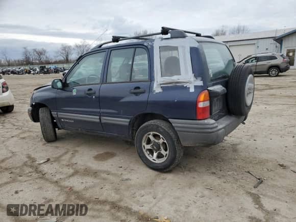 2000 Chevrolet Tracker with VIN 2CNBJ13C0Y6917889, listed as a Copart auction lot 42703105 with Not provided miles and Salvage title. Bid and sale history available at DreamBid. Image 2.