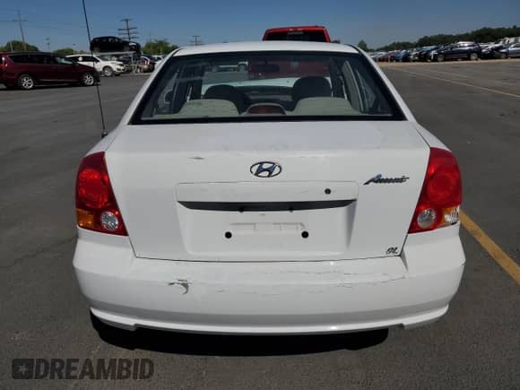 2003 Hyundai Accent GL z VIN KMHCG45C73U427901, wystawiony jako Copart lot #63874575 z przebiegiem 134 268 mil mil oraz Szkoda całkowita • Salvage title. Historia ofert i sprzedaży dostępna na DreamBid. Obrazek 6.