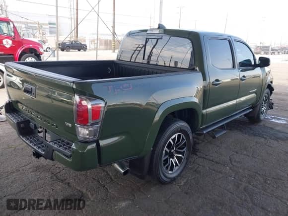 2022 Toyota Tacoma SR5 with VIN 3TMAZ5CN8NM180525, listed as a IAAI auction lot 42750259 with 52,414 mi miles and . Bid and sale history available at DreamBid. Image 4.