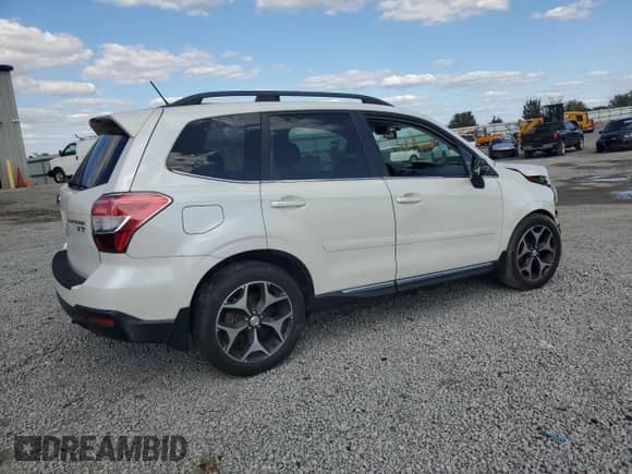 2015 Subaru Forester XT Touring with VIN JF2SJGUC5FH835803, listed as a Copart auction lot 81013615 with 102,853 mi miles and Salvage title. Bid and sale history available at DreamBid. Image 3.