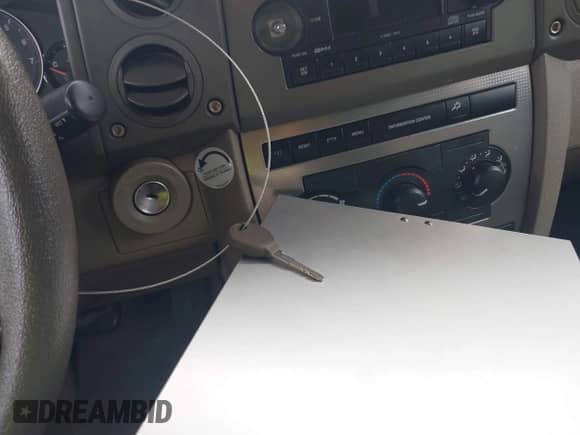 2006 Jeep Commander with VIN 1J8HH48N76C293897, listed as a IAAI auction lot 42021253 with 214,412 mi miles and . Bid and sale history available at DreamBid. Image 11.