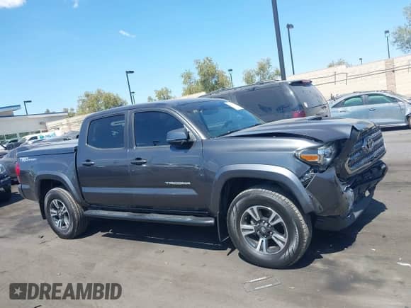 2016 Toyota Tacoma SR5 with VIN 3TMAZ5CNXGM009360, listed as a IAAI auction lot 43186084 with 89,490 mi miles and . Bid and sale history available at DreamBid. Image 14.