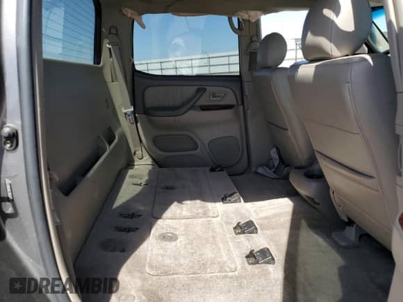2006 Toyota Tundra Limited z VIN 5TBET38106S513582, wystawiony jako Copart lot #69153895 z przebiegiem 141 292 mil mil oraz Szkoda całkowita • Salvage title. Historia ofert i sprzedaży dostępna na DreamBid. Obrazek 10.
