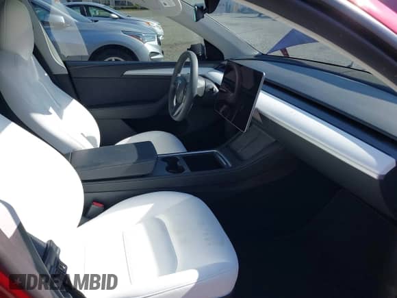 2023 Tesla Model Y Long Range с VIN 7SAYGDEE2PA203915, выставлен на аукционе IAAI как лот 42858922 с пробегом 14 429 миль миль и . История ставок и продаж доступна на DreamBid. Изображение 5.