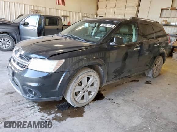 2012 Dodge Journey Crew with VIN 3C4PDCDGXCT271022, listed as a Copart auction lot 80489515 with 224,501 mi miles and Salvage title. Bid and sale history available at DreamBid. Image 1.