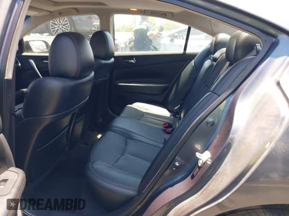 2013 Nissan Maxima S with VIN 1N4AA5AP3DC839662, listed as a IAAI auction lot 42328504 with 106,936 mi miles and . Bid and sale history available at DreamBid. Image 8.