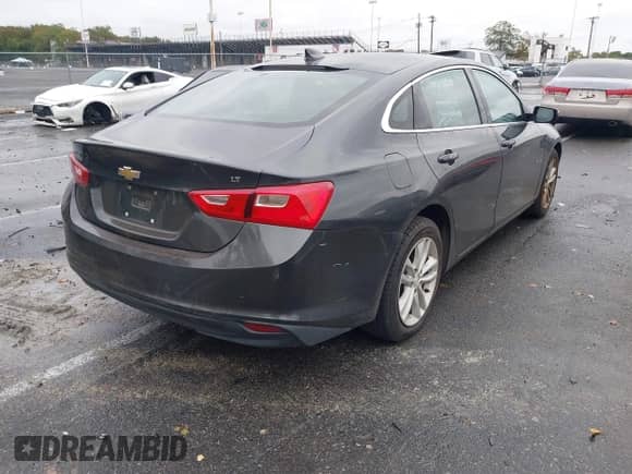 2016 Chevrolet Malibu LT z VIN 1G1ZE5ST1GF322773, wystawiony jako IAAI lot #43389880 z przebiegiem 99 582 mil mil oraz . Historia ofert i sprzedaży dostępna na DreamBid. Obrazek 4.
