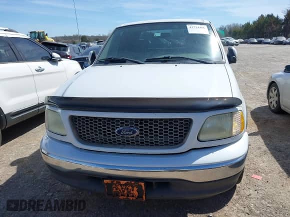 2003 Ford F-150 XL with VIN 1FTRX17W03NA37401, listed as a IAAI auction lot 41724466 with 350,336 mi miles and . Bid and sale history available at DreamBid. Image 13.