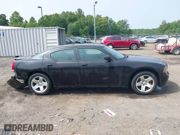 2009 Dodge Charger SE with VIN 2B3LA43V39H639833, listed as a IAAI auction lot 42423543 with 174,611 mi miles and . Bid and sale history available at DreamBid. Image 13.