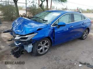 2016 Chevrolet Cruze Premier z VIN 1G1BG5SM3G7271551, wystawiony jako IAAI lot #42988853 z przebiegiem 87 746 mil mil oraz . Historia ofert i sprzedaży dostępna na DreamBid. Obrazek 2.