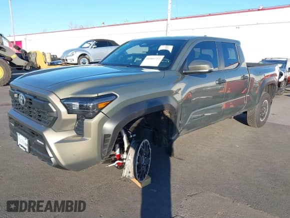 2024 Toyota Tacoma SR5 with VIN 3TMLB5JN6RM048448, listed as a IAAI auction lot 41005722 with 1,562 mi miles and . Bid and sale history available at DreamBid. Image 2.