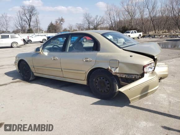 2002 Hyundai Sonata z VIN KMHWF25S42A656824, wystawiony jako Copart lot #46411645 z przebiegiem 194 814 mil mil oraz Szkoda całkowita • Salvage title. Historia ofert i sprzedaży dostępna na DreamBid. Obrazek 2.