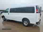 2013 Chevrolet Express Passenger LT with VIN 1GAZG1FG4D1137965, listed as a Copart auction lot 59378755 with 115,805 mi miles and Salvage title. Bid and sale history available at DreamBid. Image 2.